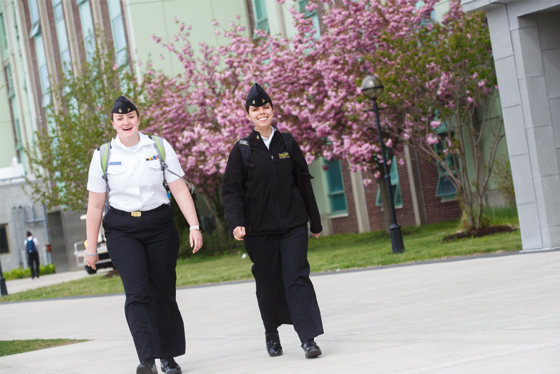 two cadets walking on campus