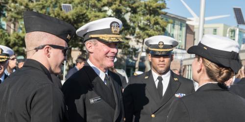 President Mcdonald with students in uniform